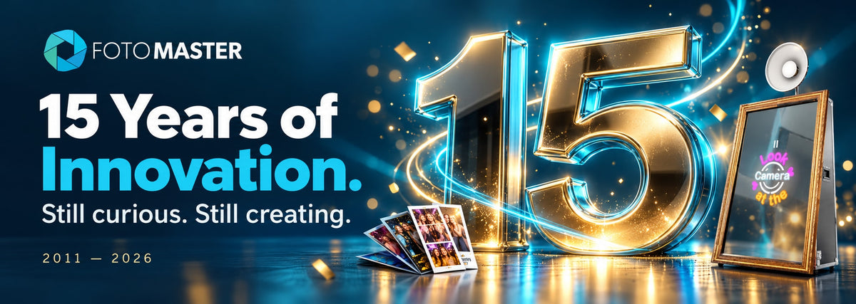 Foto Master celebrates 15 years of innovation, 2011–2026, with a glowing gold and cyan 15, the original Mirror Me Booth, and photo keepsakes. Still curious. Still creating.
