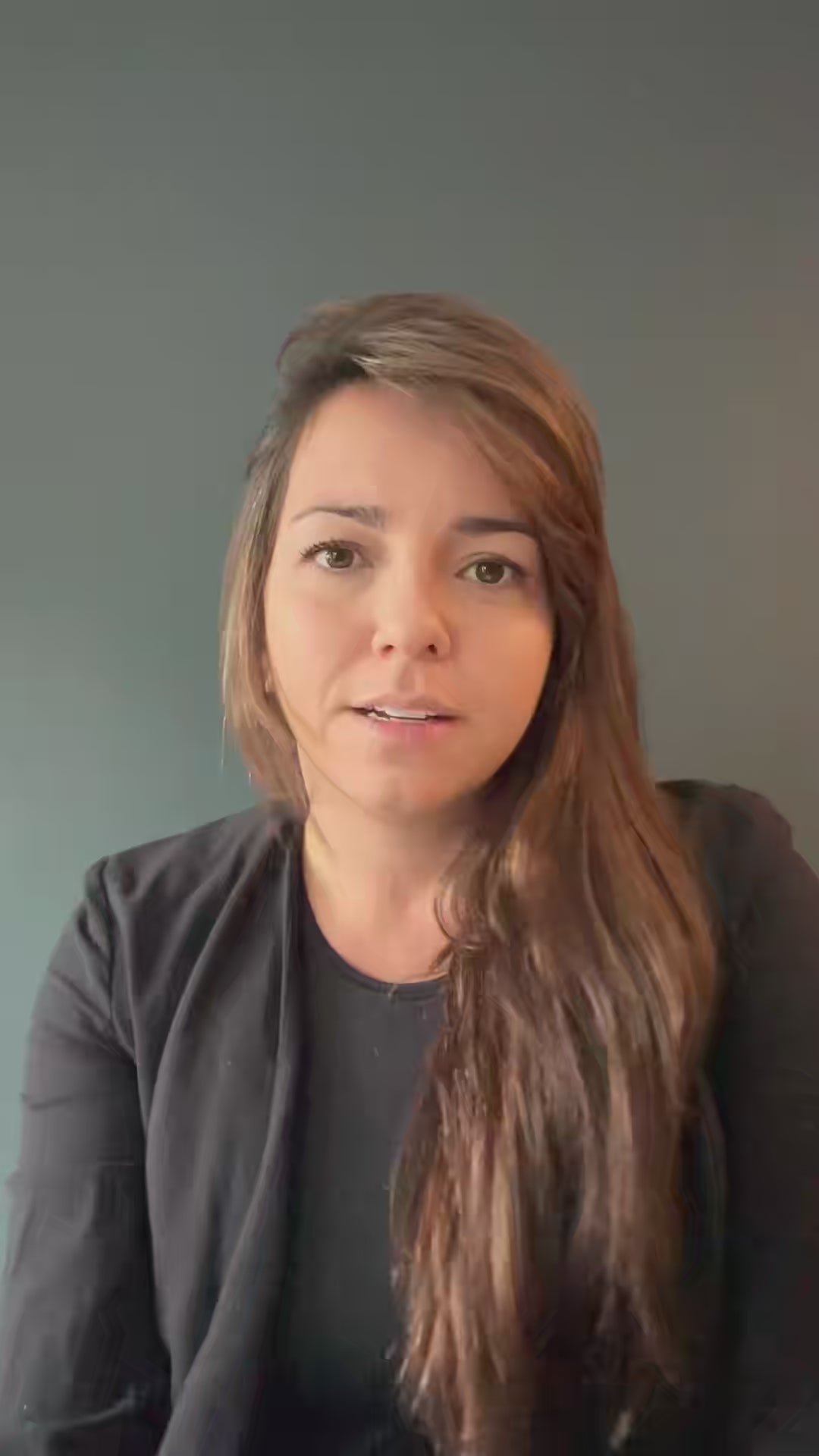 Woman with straight brown hair (Liv Van Deurzen) of Snap Beauty Photo Booth speaking about her photo booth business on video.
