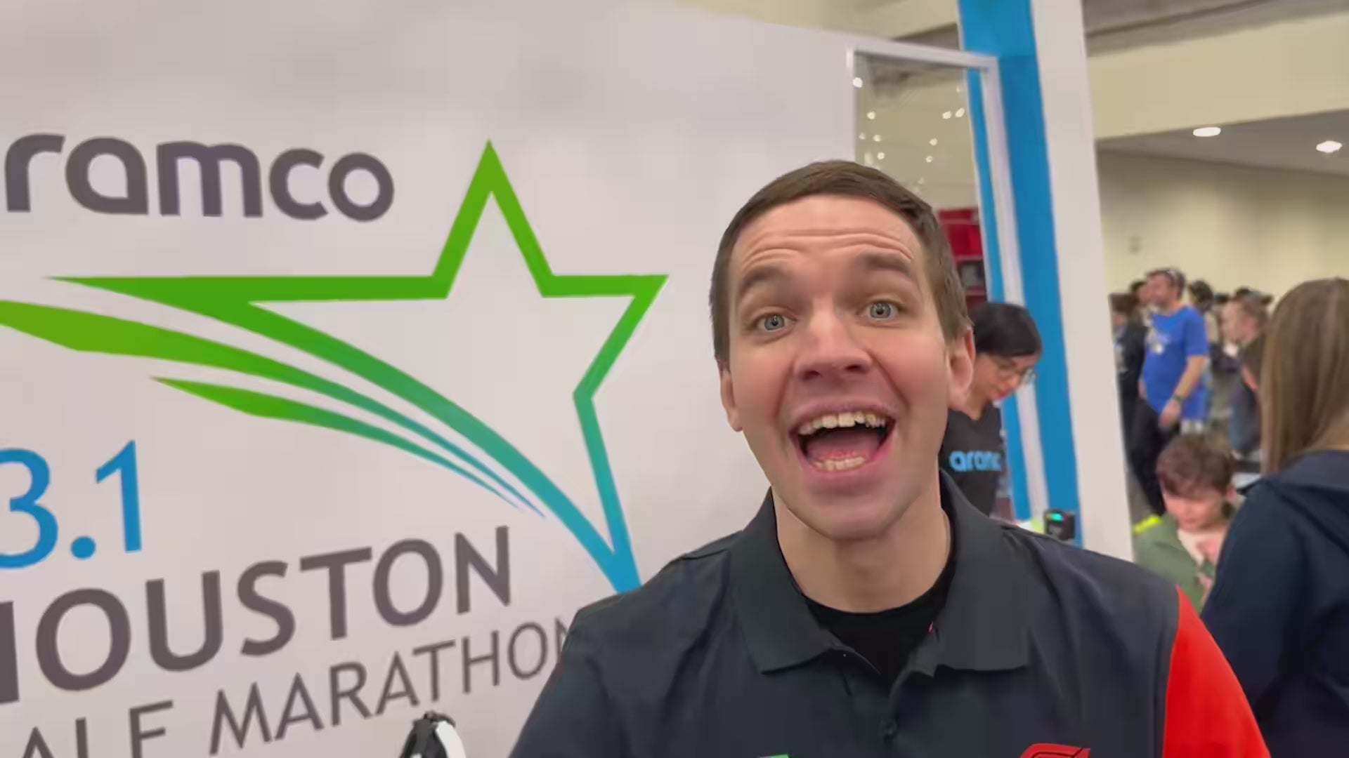 Smiling man with short brown hair of Interactive Entertainment Group, filmed at event for a photo booth testimonial.