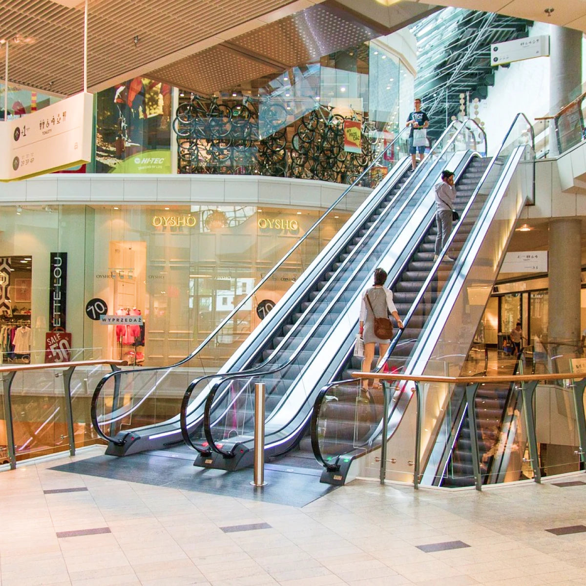 Mall interior with kiosk space, showing photo booths are suitable for retailers industries.