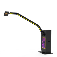 V-Motion 180 photo booth with extended arm and vibrant screen.