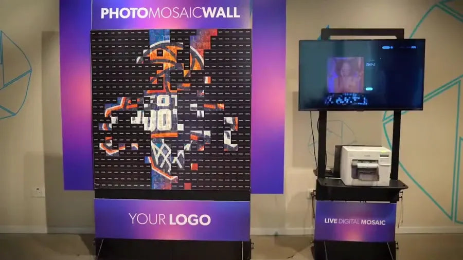 Guests building a physical photo mosaic wall